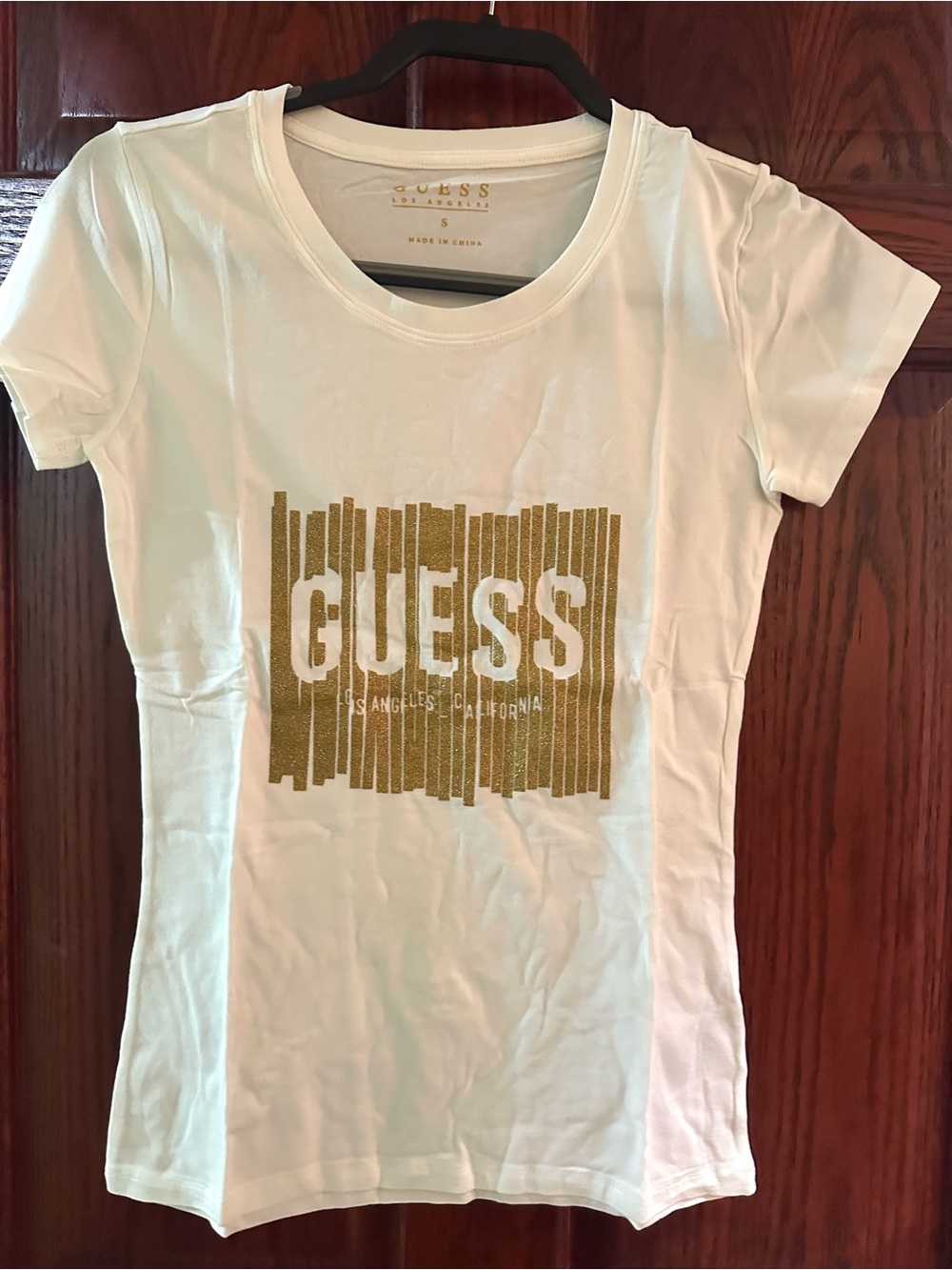 GUESS White Short Sleeve Tee with Gold Graphic Logo